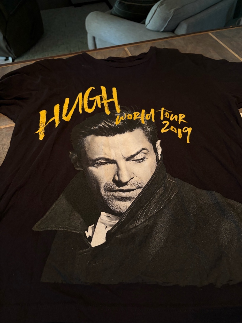 Unisex Hugh Hackman  Black Short-Sleeve Graphic Tee with Yellow Print- roomie Lg